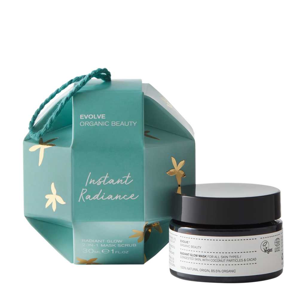 radiant glow 2-in-1 mask scrub chocolate face mask in amber glass jar packaged in turquoise and gold bauble with a hanging loop from Evolve Organic Beauty