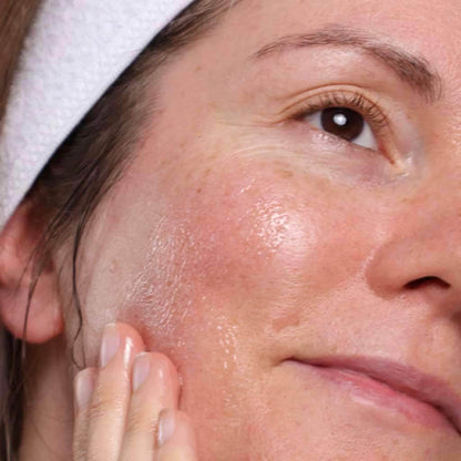 skincare model cleansing face with kalahari dream organic facial cleansing oil